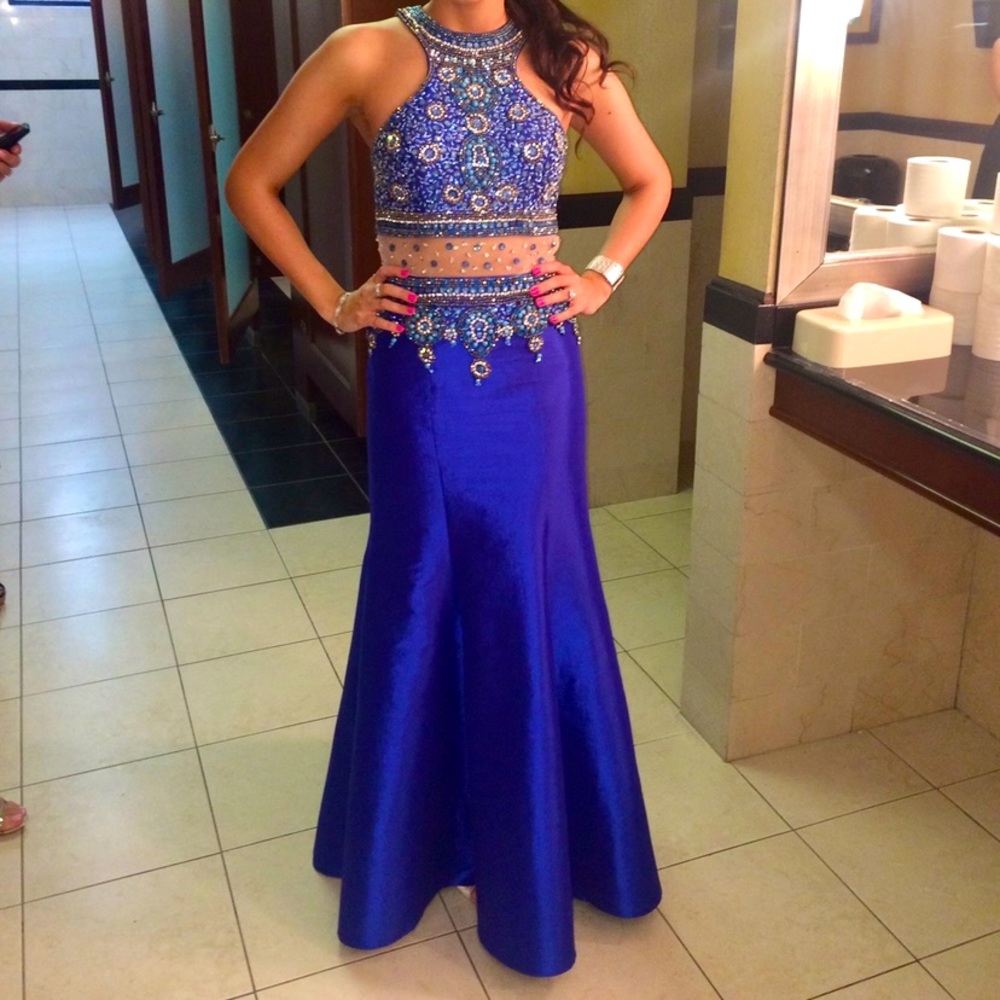 Beaded dress with sheer mid section lining.